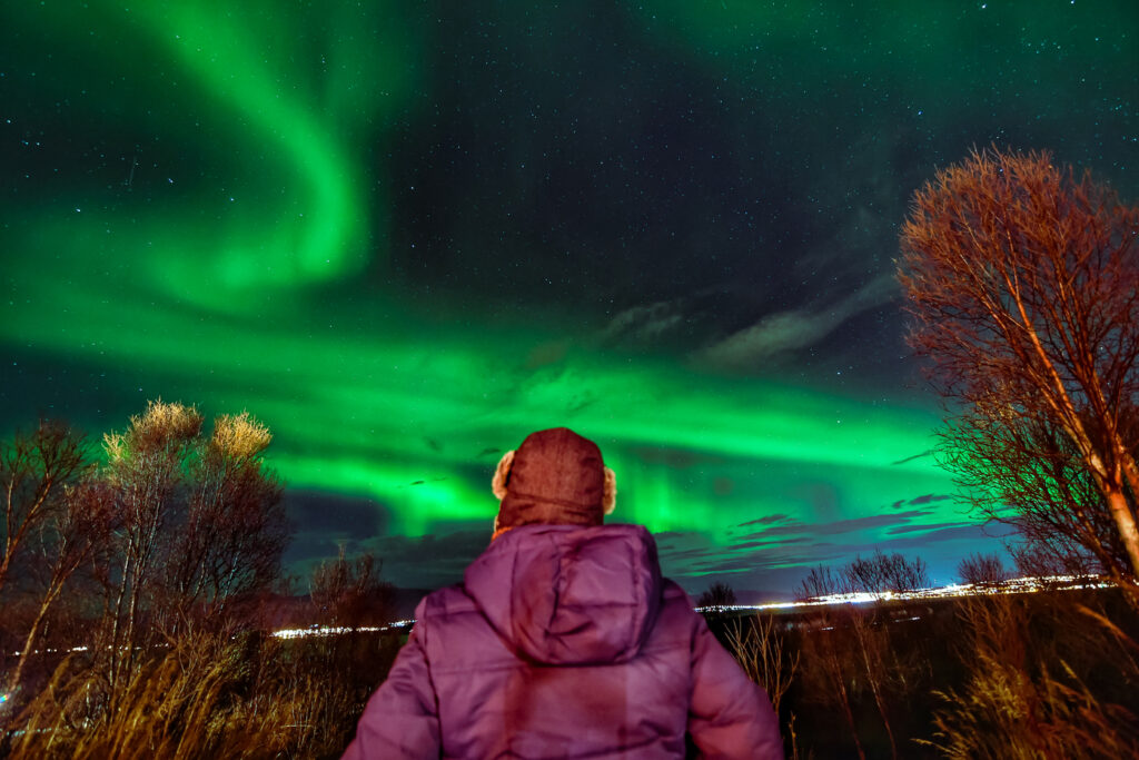 rear-view-mature-man-looking-aurora-borealis-sky-night